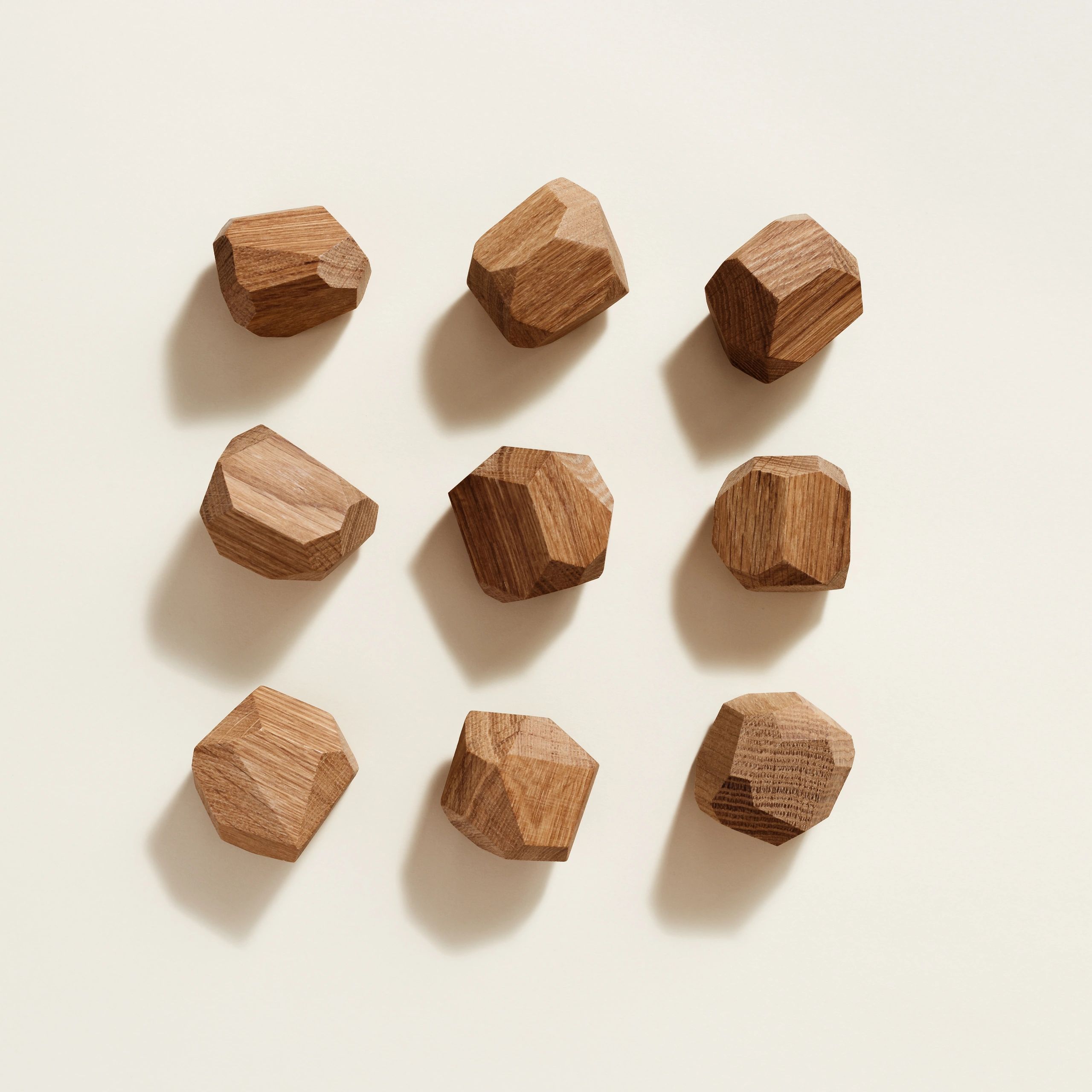 Modern wooden geometric blocks arranged as a small sculptural accent
