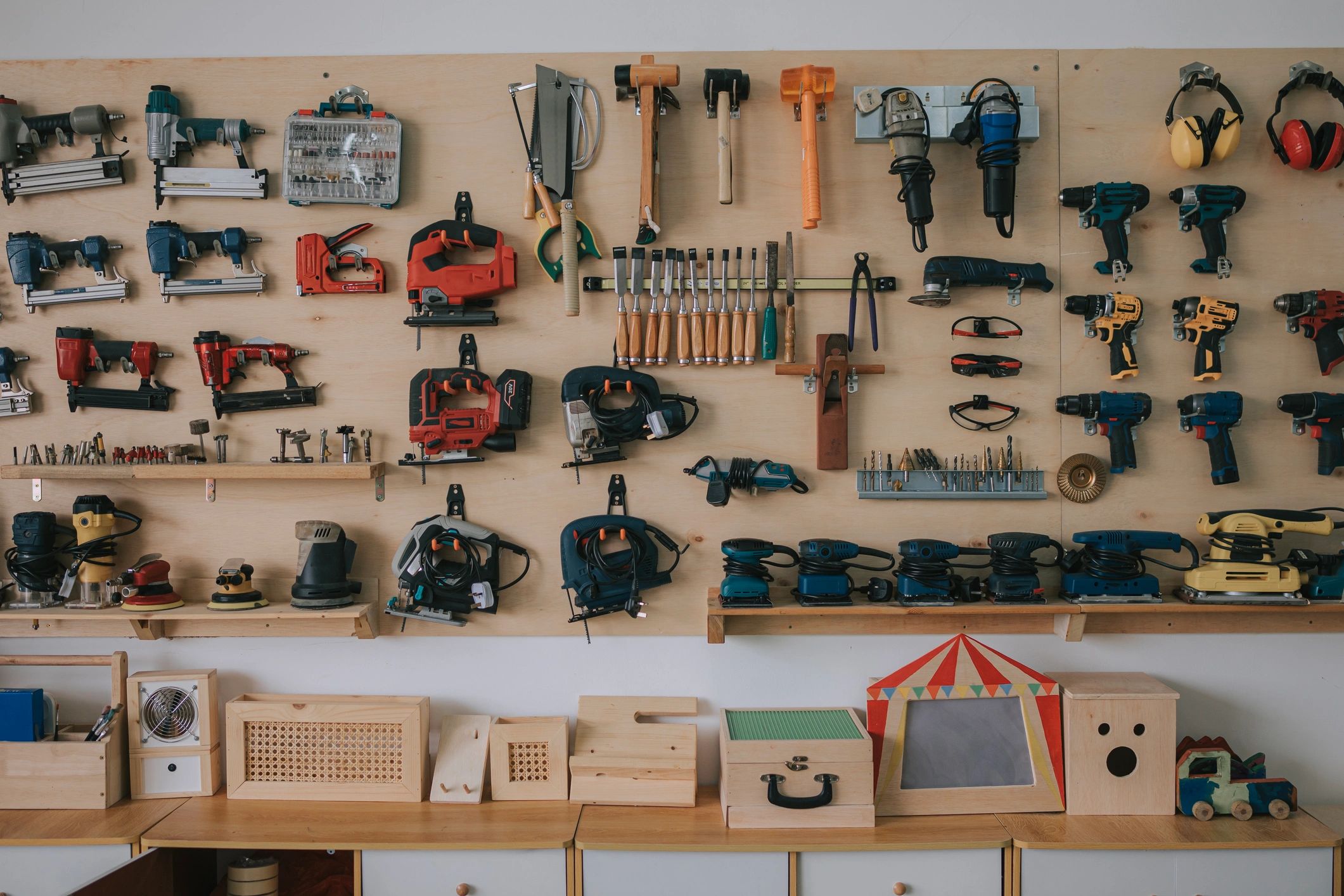 Woodworking hand tools on a workbench in a carpentry studio