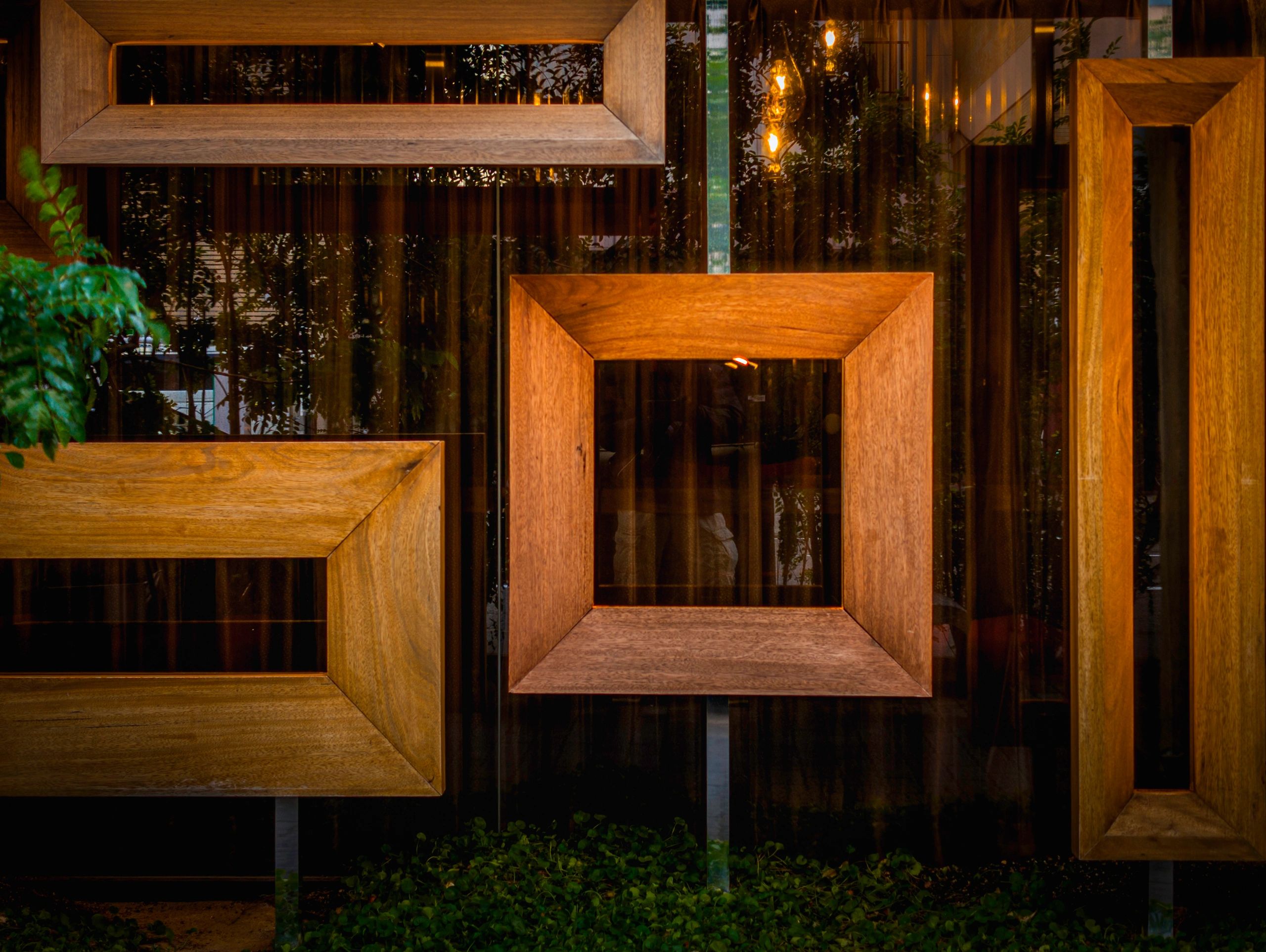 Abstract arrangement of wooden frames and geometric shapes